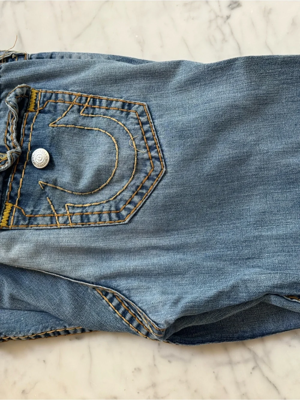 True Religion Light Blue Boot Cut Jeans with Signature Pocket Stitch